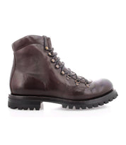 Bed|Stü Barge dark brown Italian leather combat boot with a rugged black sole, shown in profile on a white background.