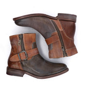 Pair of Becca brown leather ankle boots by Bed|Stü, featuring a sturdy leather shaft, side zippers, and ankle buckles, shown from the side and bottom against a white background.