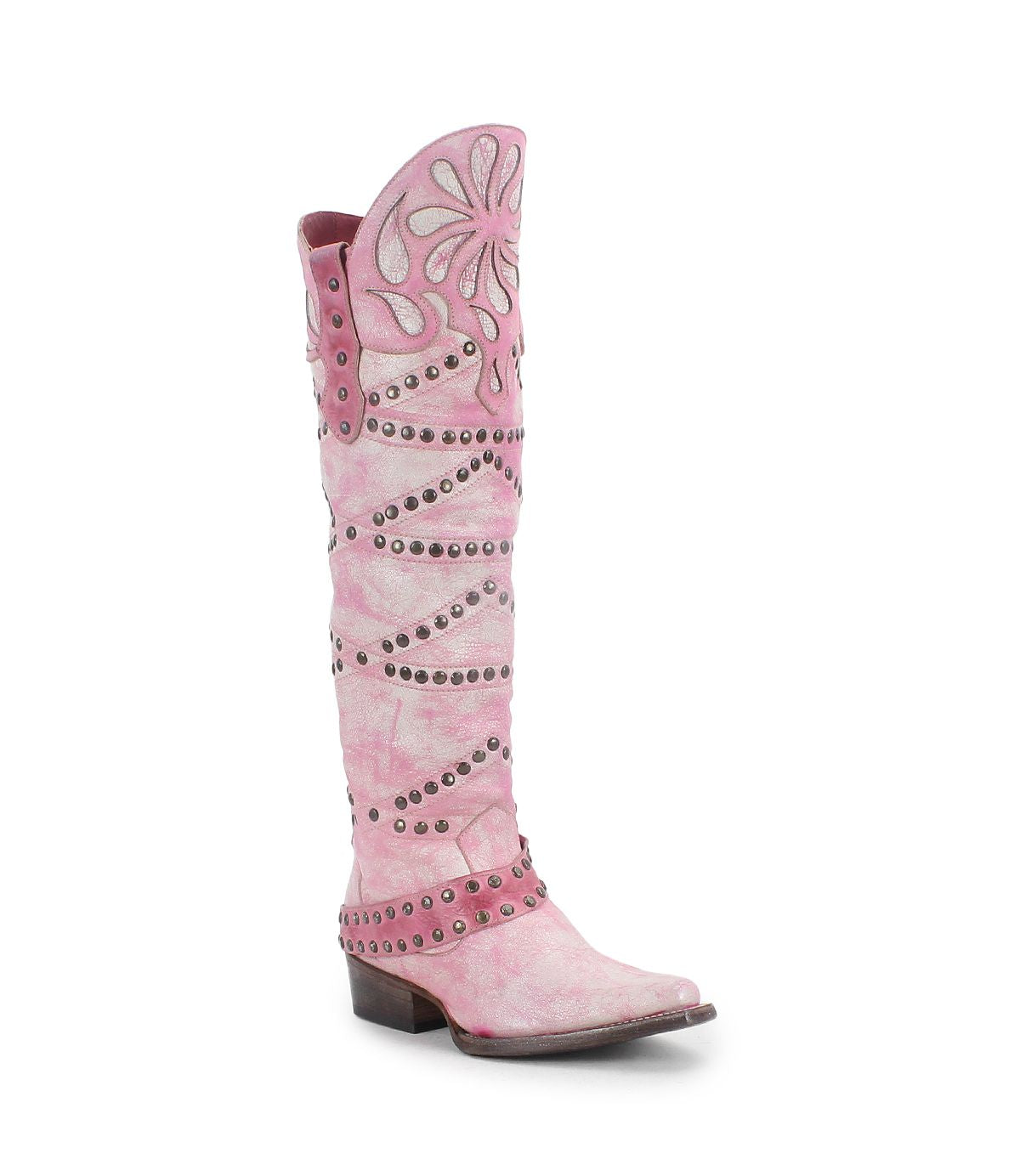 The Betting boot by Bed|Stü is a pink knee-high cowboy boot with white floral inlays and metal studs, featuring handcrafted leather construction, a pointed toe, and a low heel.