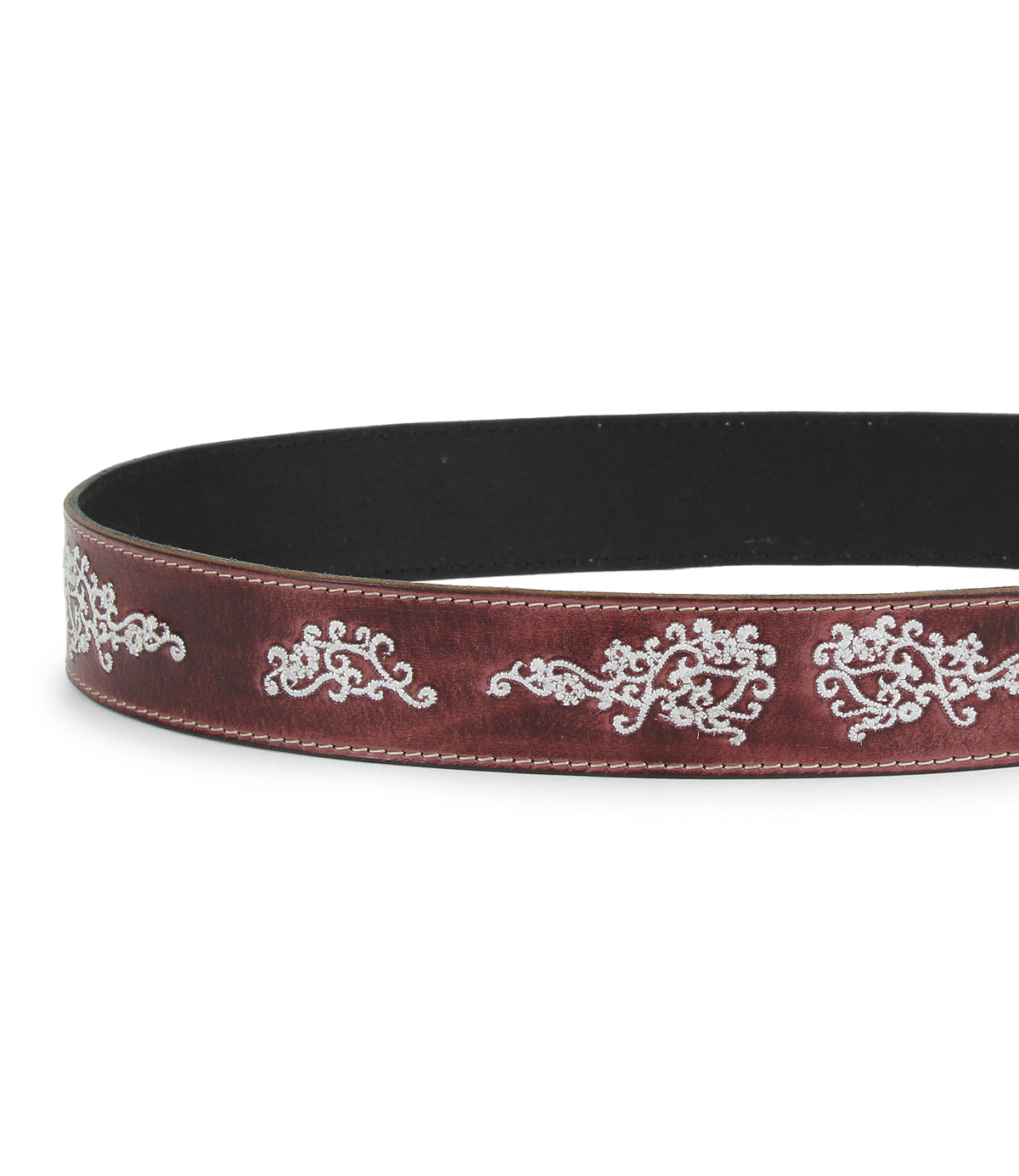The Blaze JB by Bed|Stü is a brown full-grain leather belt featuring intricate white stitched patterns and prominent white stitching along the edges, finished with an antique-style buckle and showcased against a plain white background.