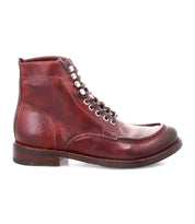 The Blimey boot by Bed|Stü is a single reddish-brown full-grain leather lace-up boot, handcrafted in Italy with stitched details, a low stacked heel, and a rounded toe, shown in side profile against a white background.