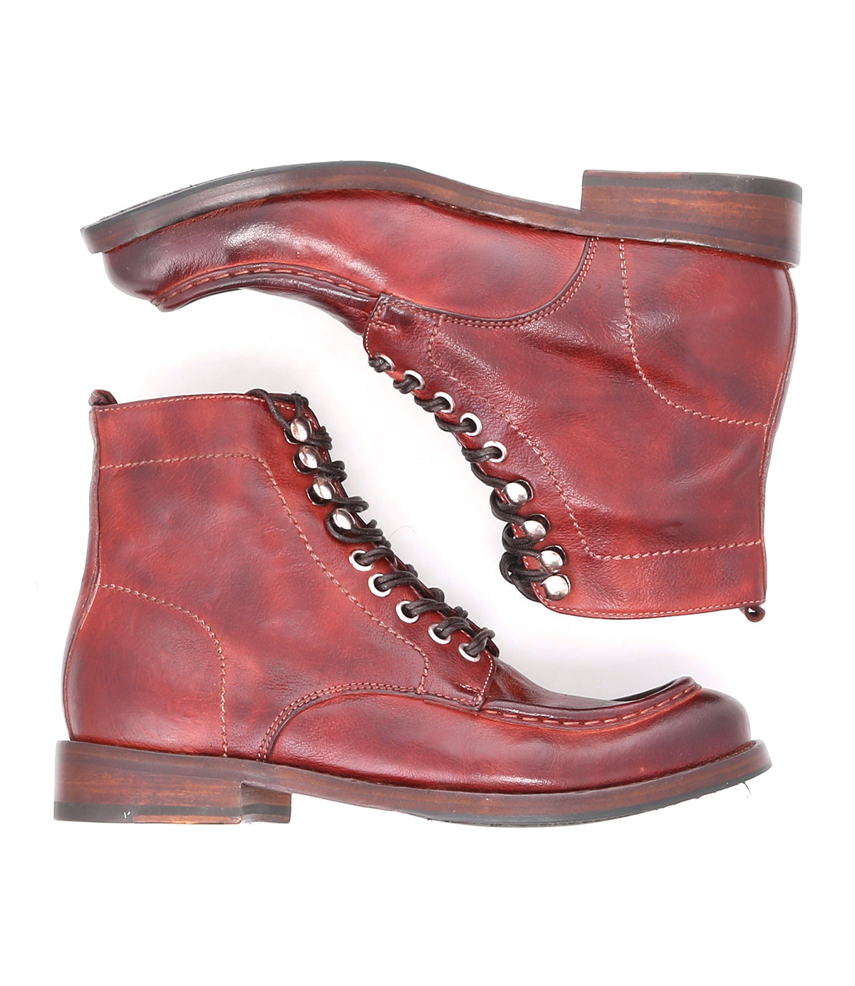 A pair of Blimey boots by Bed|Stü, crafted from reddish-brown full-grain leather with visible stitching and dark brown soles, handcrafted in Italy and displayed side by side on a white background.