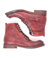 A pair of Blimey boots by Bed|Stü, crafted from reddish-brown full-grain leather with visible stitching and dark brown soles, handcrafted in Italy and displayed side by side on a white background.