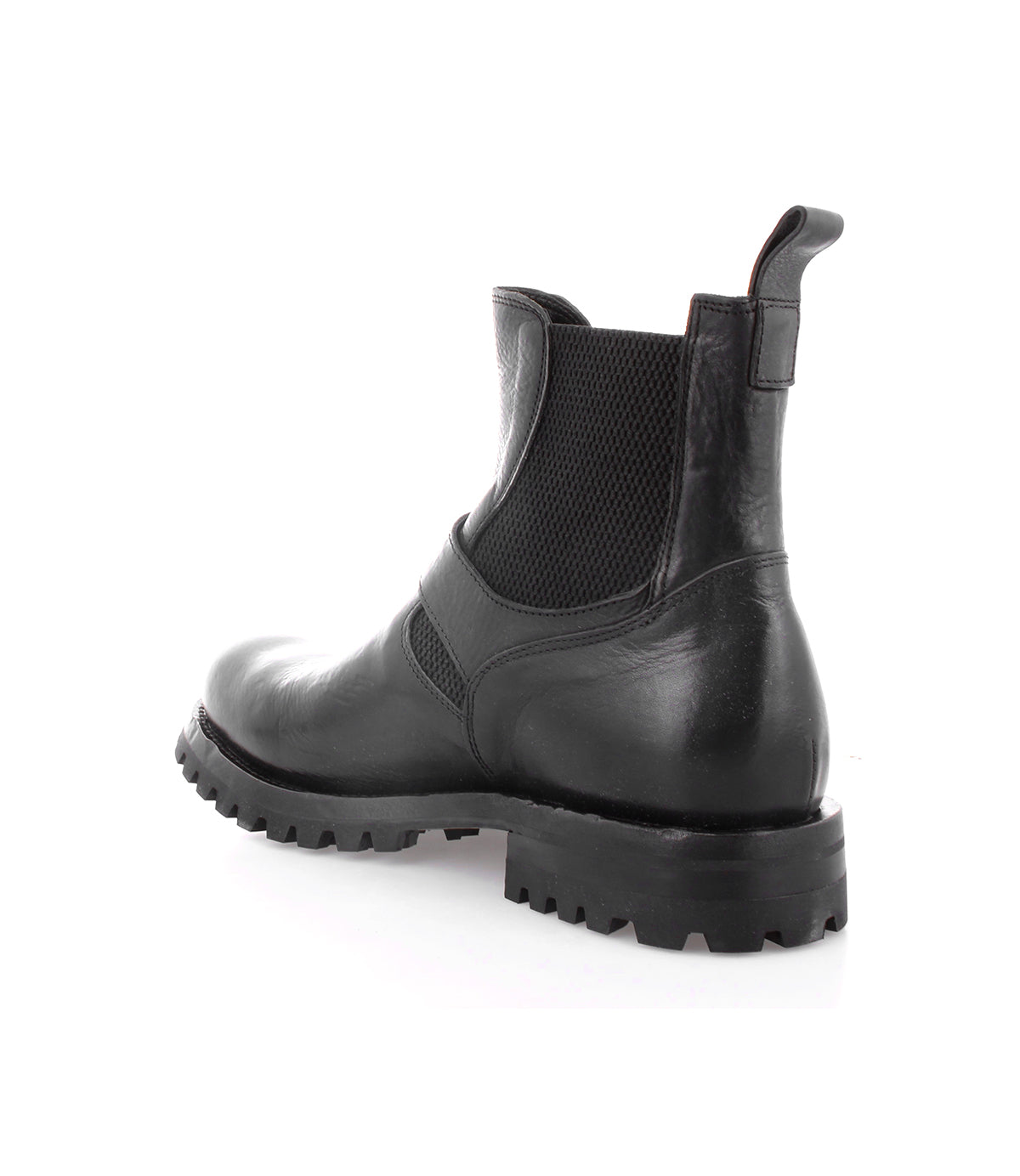 The Boast Chelsea Boot by Bed|Stü is a men's boot crafted from full-grain black leather, featuring elastic side panels and a rugged rubber sole, shown from a rear side angle on a white background.