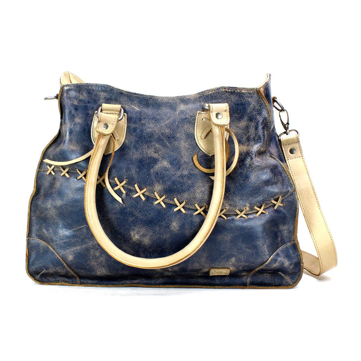 Introducing Bruna by Bed|Stü—a blue leather crossbody shoulder bag accented with cream handles and strap, and finished with distinctive tan crisscross stitching across the front. This elegant two-toned leather bag blends style and functionality perfectly.