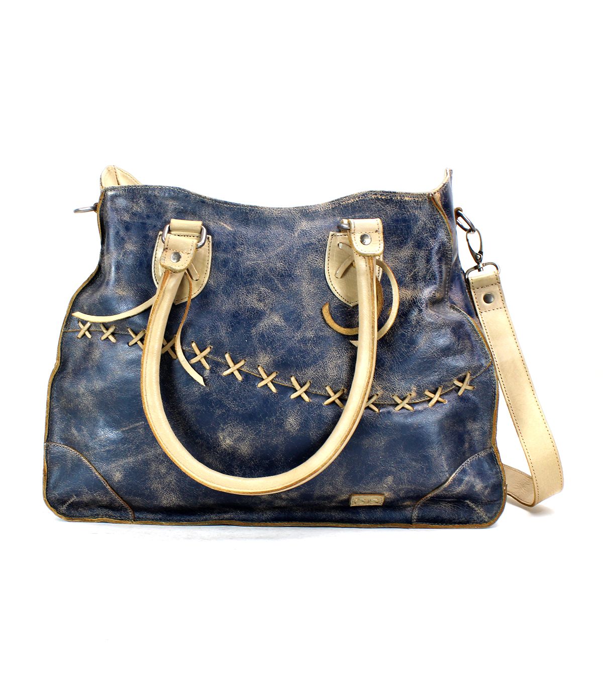 Introducing Bruna by Bed|Stü—a blue leather crossbody shoulder bag accented with cream handles and strap, and finished with distinctive tan crisscross stitching across the front. This elegant two-toned leather bag blends style and functionality perfectly.