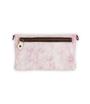 The Cadence pouch by Bed|Stü is a rectangular accessory in pink and white, featuring a visible front zipper with a brass pull tab and a slightly textured surface made from vegetable-tanned leather, photographed against a white background.