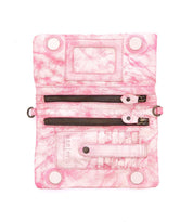 The Bed|Stü Cadence pink marbled 3-in-1 leather wallet, featuring two zippered compartments, card slots, snap buttons, and a clear ID window, is displayed flat on a white background.