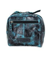 Introducing Capture by Bed|Stü—a compact, square crossbody bag crafted from distressed leather in striking black and teal. This handbag features a front zipper pocket and a stitched Bed|Stü logo patch, blending everyday functionality with standout style.