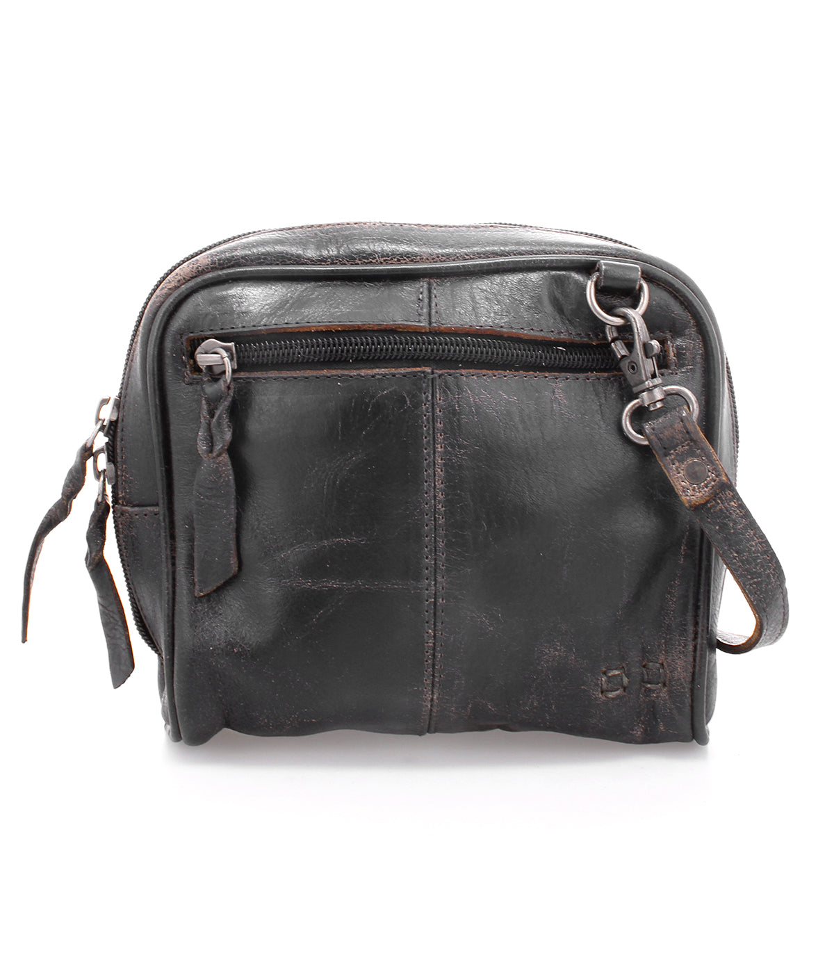 The Bed|Stü Capture is a small, black leather crossbody bag featuring a front zipper pocket, worn edges, and an adjustable strap; this compact handbag is displayed against a white background.