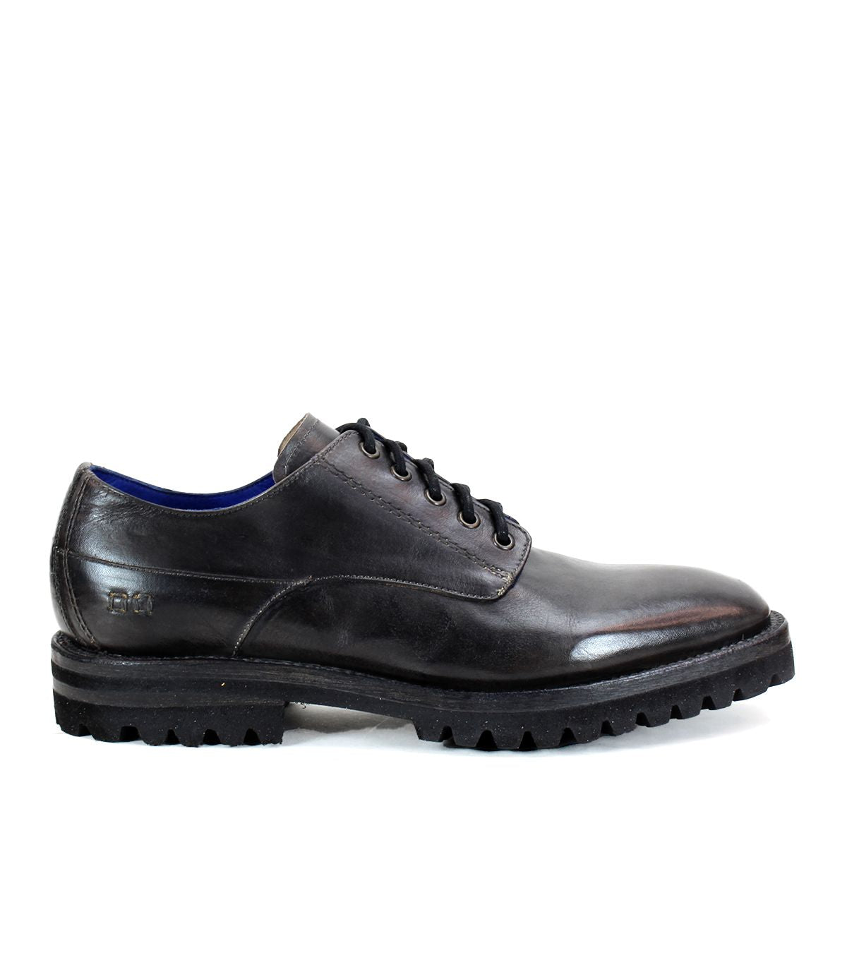 The Bed|Stü Carter is a black leather oxford dress shoe featuring rugged tread and Goodyear welt construction, shown from the side against a plain white background.