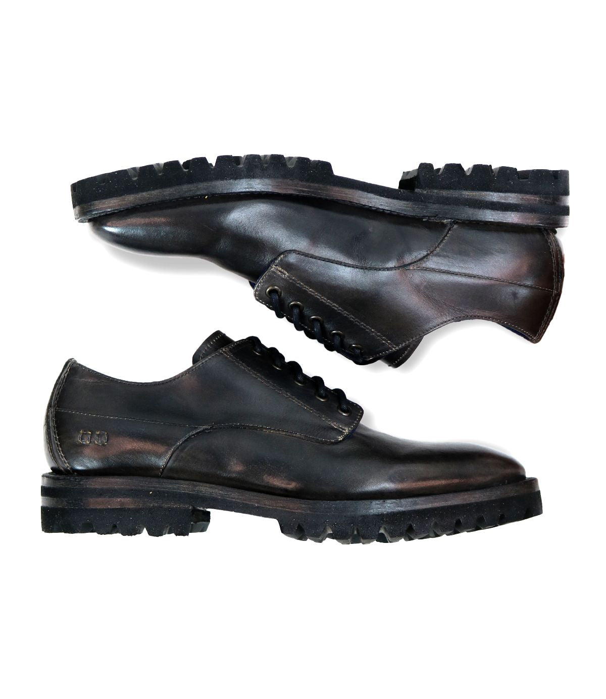 Two Carter black leather lace-up shoes by Bed|Stü, featuring rugged outsoles and thick, durable soles, are positioned horizontally—one above the other—against a white background.
