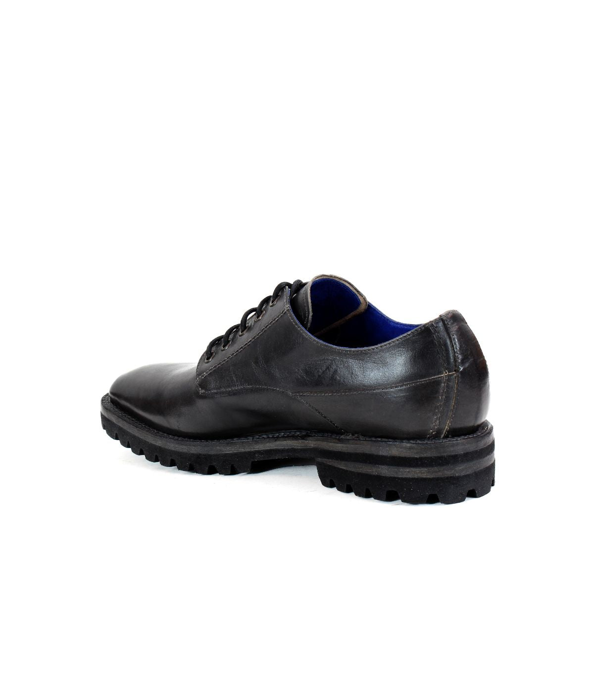 A single Bed|Stü Carter black leather lace-up oxford dress shoe with a rugged outsole, shown from the back against a white background.