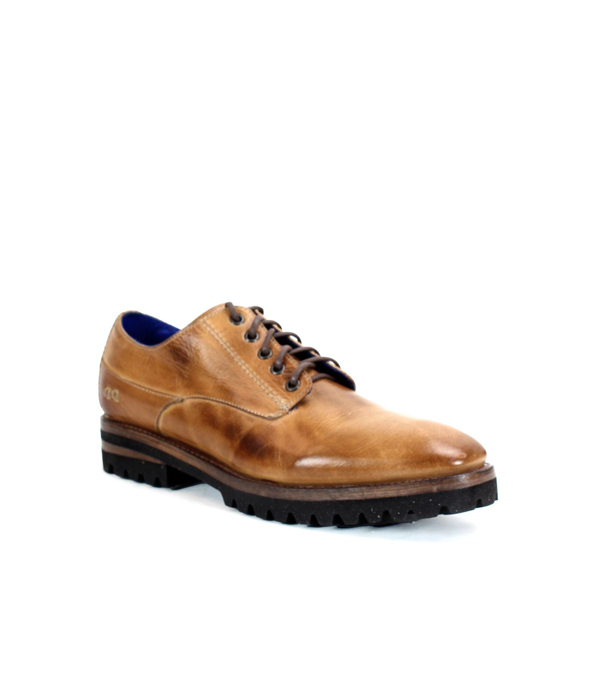 The Bed|Stü Carter is a brown leather oxford dress shoe with black laces, a rounded toe, blue inner lining, and a rugged outsole made of thick black rubber, shown on a white background.