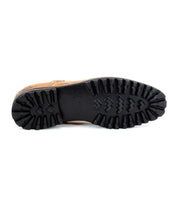 Bottom view of the Bed|Stü Carter brown oxford dress shoe, featuring a thick black rubber sole with deep, rugged tread patterns and durable Goodyear welt construction for enhanced traction and longevity.