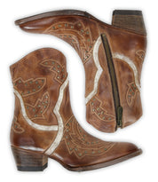 Introducing Chamise by Bed|Stü—a pair of brown leather cowboy boots adorned with decorative stitching and metal studs, featuring a side zipper and stacked heel. These stylish western boots perfectly blend classic charm with everyday practicality.