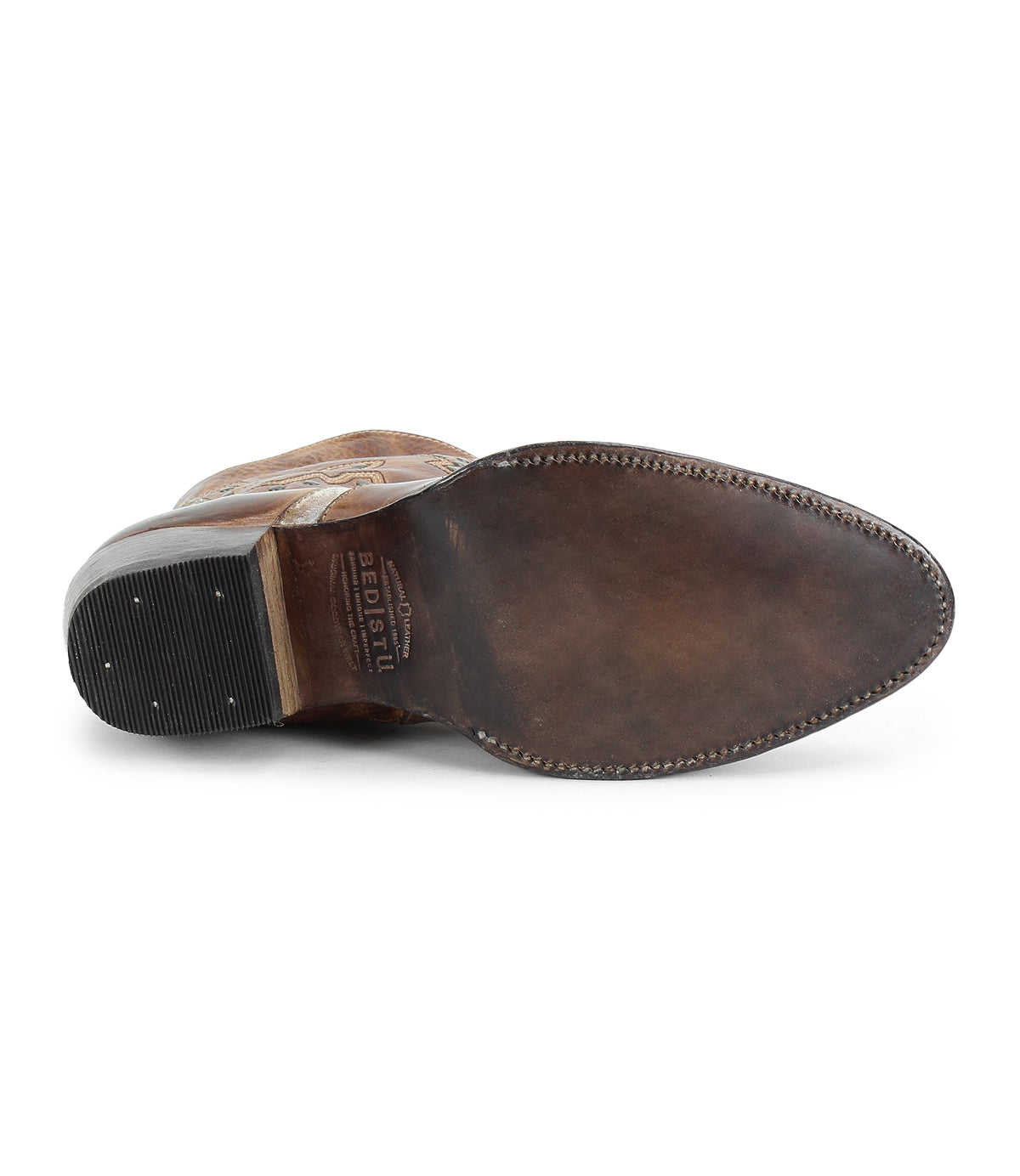A brown leather Chamise dress shoe by Bed|Stü is displayed from the bottom, showcasing its stitched leather sole and small black heel with partial Bed|Stü branding near the arch—crafted with the same meticulous detail found in a classic leather boot.