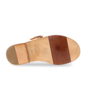 The image shows the sole of the Bed|Stü Charka shoe in tan vegetable vacchetta leather, featuring a wooden midsection, a rubber heel cap, and “Bed|Stü” branding along with size 39 stamped on the sole.