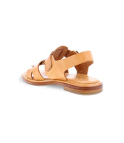 The Charka sandal by Bed|Stü is a tan handmade Italian shoe featuring an open toe and heel, multiple straps crafted from vegetable vacchetta leather, and a flat sole, showcased from a rear angled view against a white background.