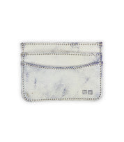 The Chuck by Bed|Stü is a white leather compact card wallet with visible stitching and two card slots, featuring a small, square logo in the bottom right corner—making it an ideal slim wallet for everyday carry.