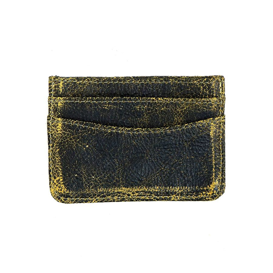 The Chuck by Bed Stu is a compact, worn dark leather card wallet with multiple slots, offering a convenient and stylish option for those seeking efficiency.