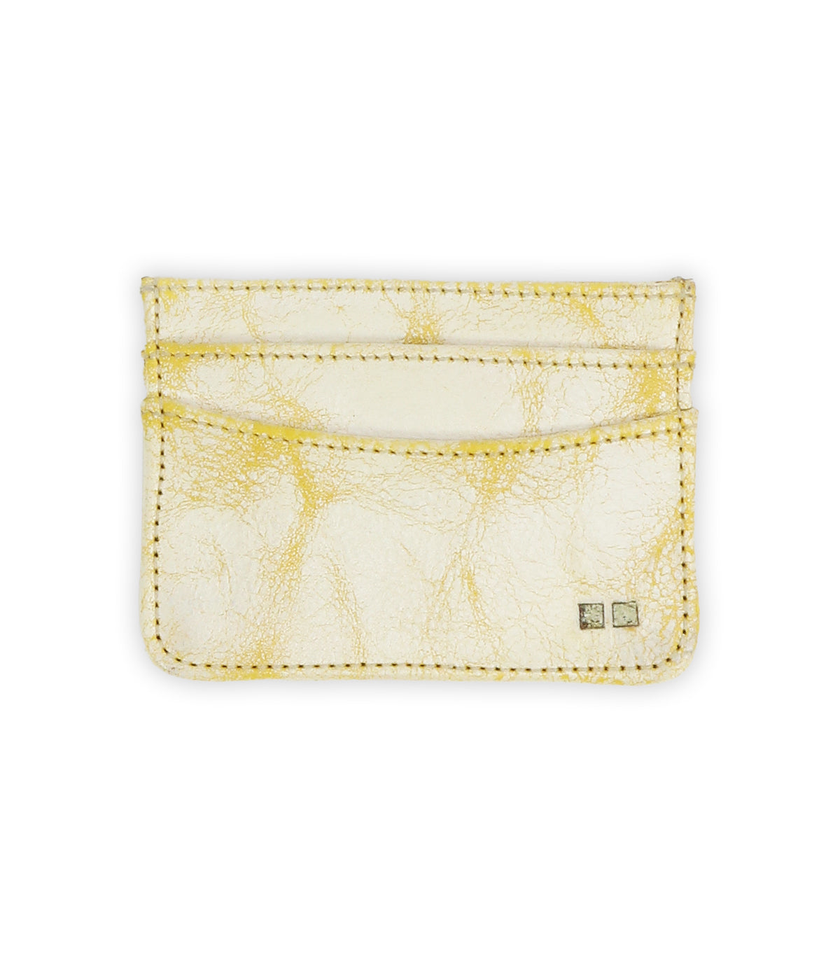 The Bed|Stü Chuck is a cream-colored leather card holder featuring yellow marbling, visible stitching, and two small square metal accents in the bottom right corner—making this compact card wallet perfect for everyday carry.