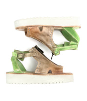 Introducing the Clancy by Bed|Stü: platform sandals featuring white soles, a brown cutout leather front, and green leather back straps arranged in opposite directions, all finished with a cushioned insole for superior comfort.