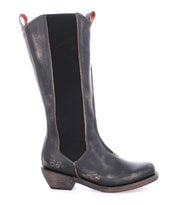 The Bed|Stü Clarisse is a single black leather mid-calf tall boot, featuring a western heel and pull tabs at the top, shown in profile on a white background.