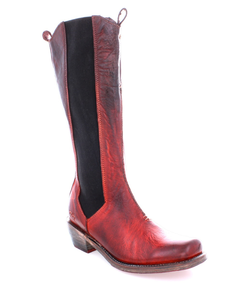 The Clarisse boot by Bed|Stü is displayed against a white background, featuring a single mid-calf tall leather design with reddish-brown front and back panels, black side panels, a low western heel, and a round toe.