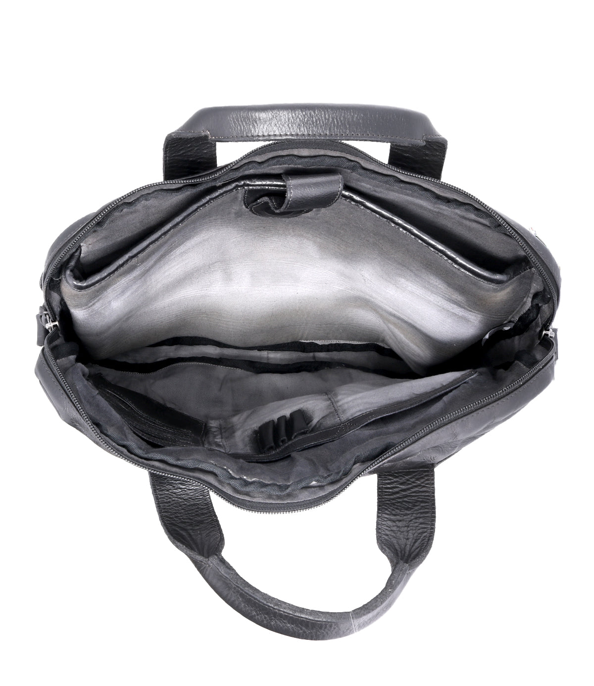 The Bed|Stü Conclusion handbag is shown open from above, displaying its empty interior made from vegetable-tanned black leather. Multiple compartments, a secure zipper closure, and a dedicated laptop section are clearly visible.
