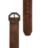 The Dreampath by Bed|Stü is a brown leather belt with a wide strap, featuring an octagon-shaped bronze metal buckle and decorative metal rivets. Crafted from genuine leather, it’s shown from both the buckle end and the tip, with multiple adjustment holes for a customized fit.