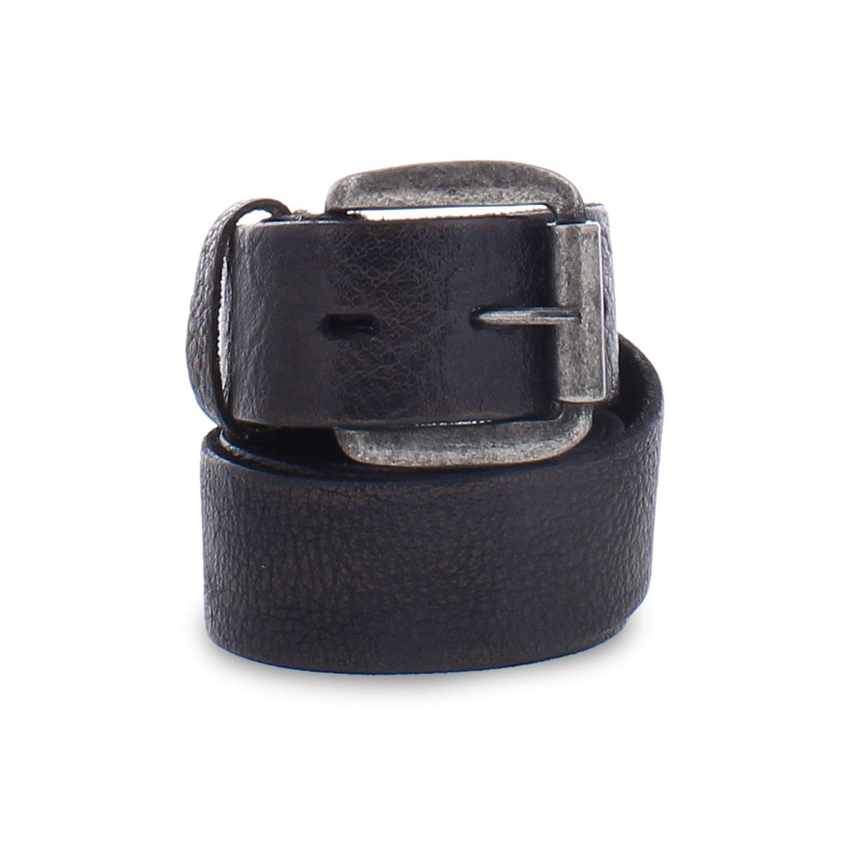 The Bed|Stü Drifter is a rolled-up black leather belt featuring a metal buckle, displayed against a white background to highlight its minimal style and textured leather strap.