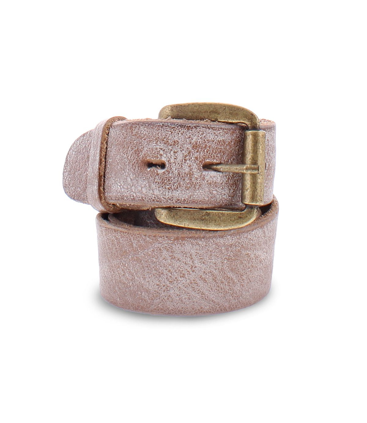 The Bed|Stü Drifter is a brown leather belt with a minimal design, featuring a textured leather strap and a sturdy metal buckle, shown rolled up and standing upright on a white background.