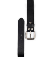 The Drifter belt by Bed|Stü is shown laid flat against a white background, showcasing its black textured leather strap in a minimal style. The sleek metal buckle and extended strap with visible holes highlight its refined design.