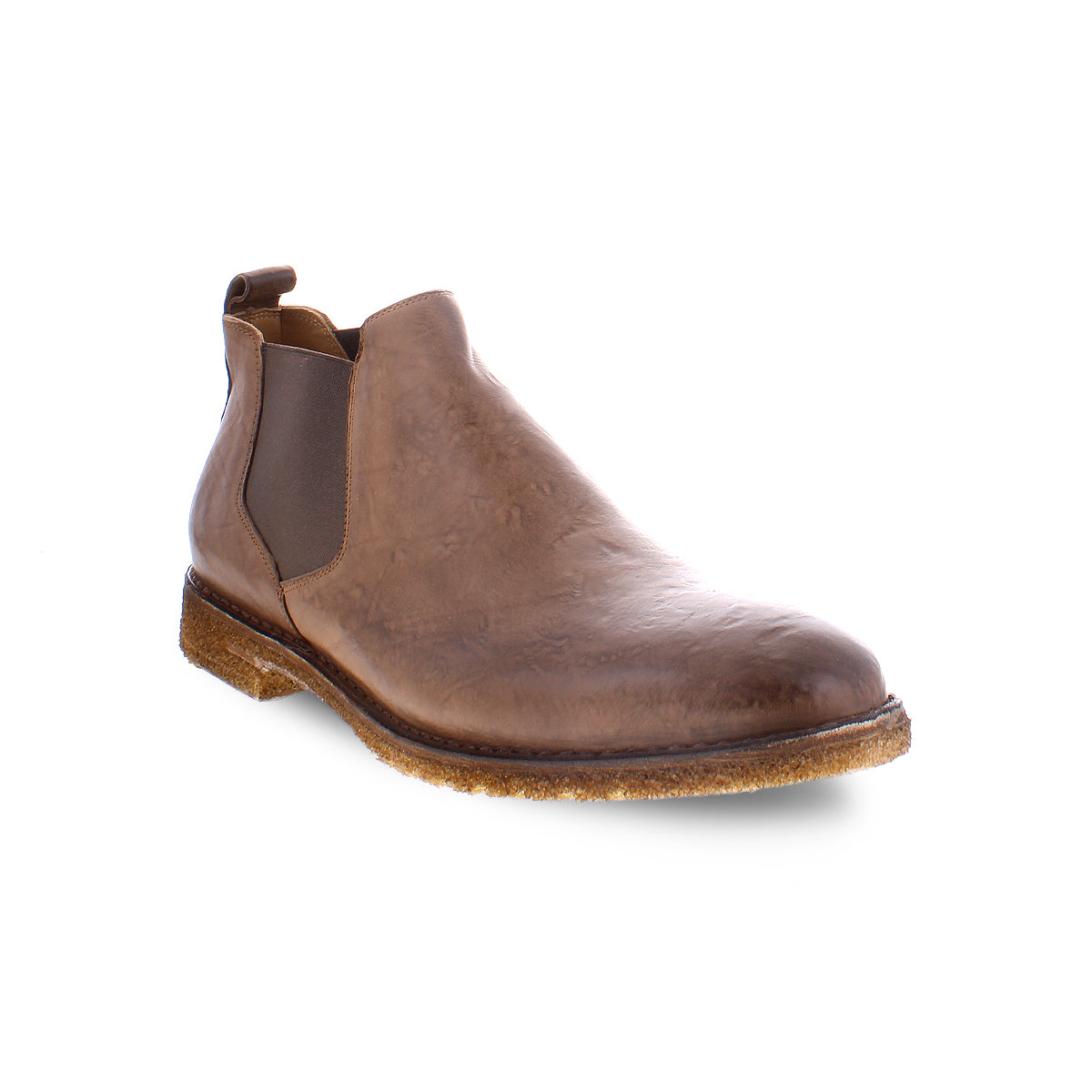 The Elude by Bed|Stü is a brown leather Chelsea boot featuring an elastic side panel, pull tab at the back, and durable rubber sole, showcased on a white background. Handcrafted in Italy, these boots offer timeless style and comfort, making them the ideal slip-on men's footwear for any occasion.