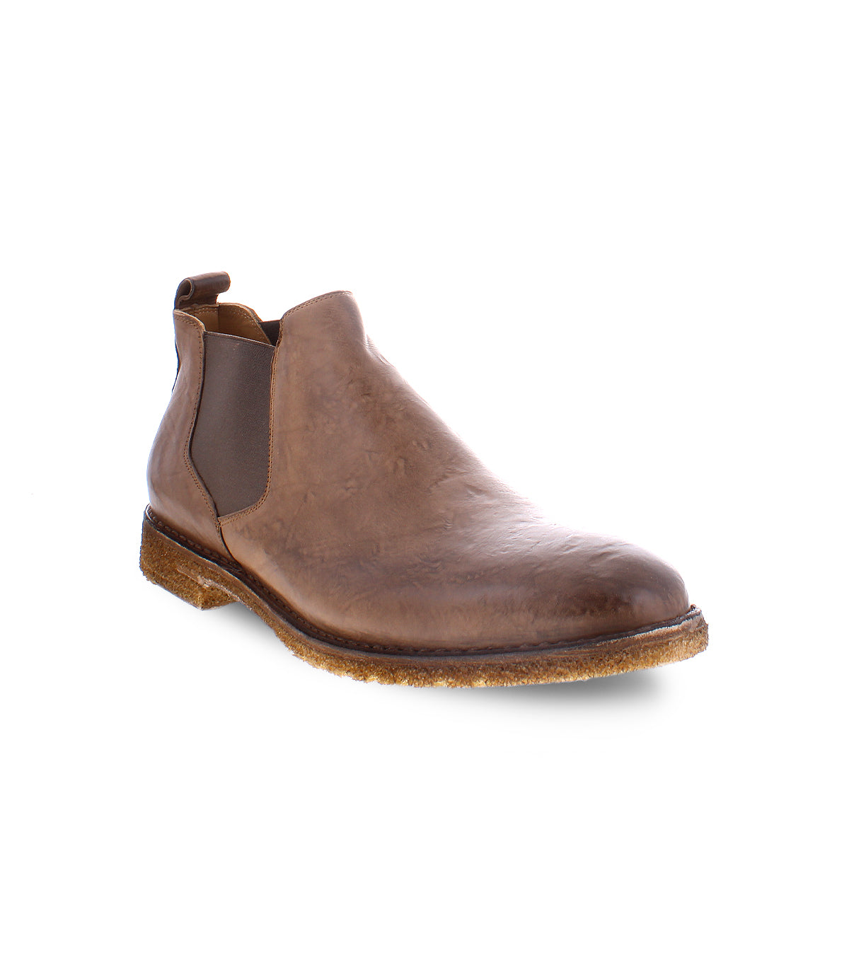 The Elude by Bed|Stü is a brown leather Chelsea boot featuring an elastic side panel, pull tab at the back, and durable rubber sole, showcased on a white background. Handcrafted in Italy, these boots offer timeless style and comfort, making them the ideal slip-on men's footwear for any occasion.
