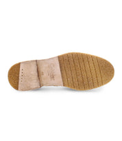 The image displays the bottom view of a single Bed|Stü Envoy loafer, featuring a handcrafted, textured sole and a partially smooth heel stamped with brand details and size number 43, underscoring its premium status as men's footwear.