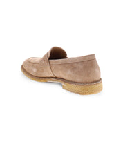 The Bed|Stü Envoy, from our premium men's footwear collection, is a beige suede loafer with a textured tan sole, shown from the back side on a white background.