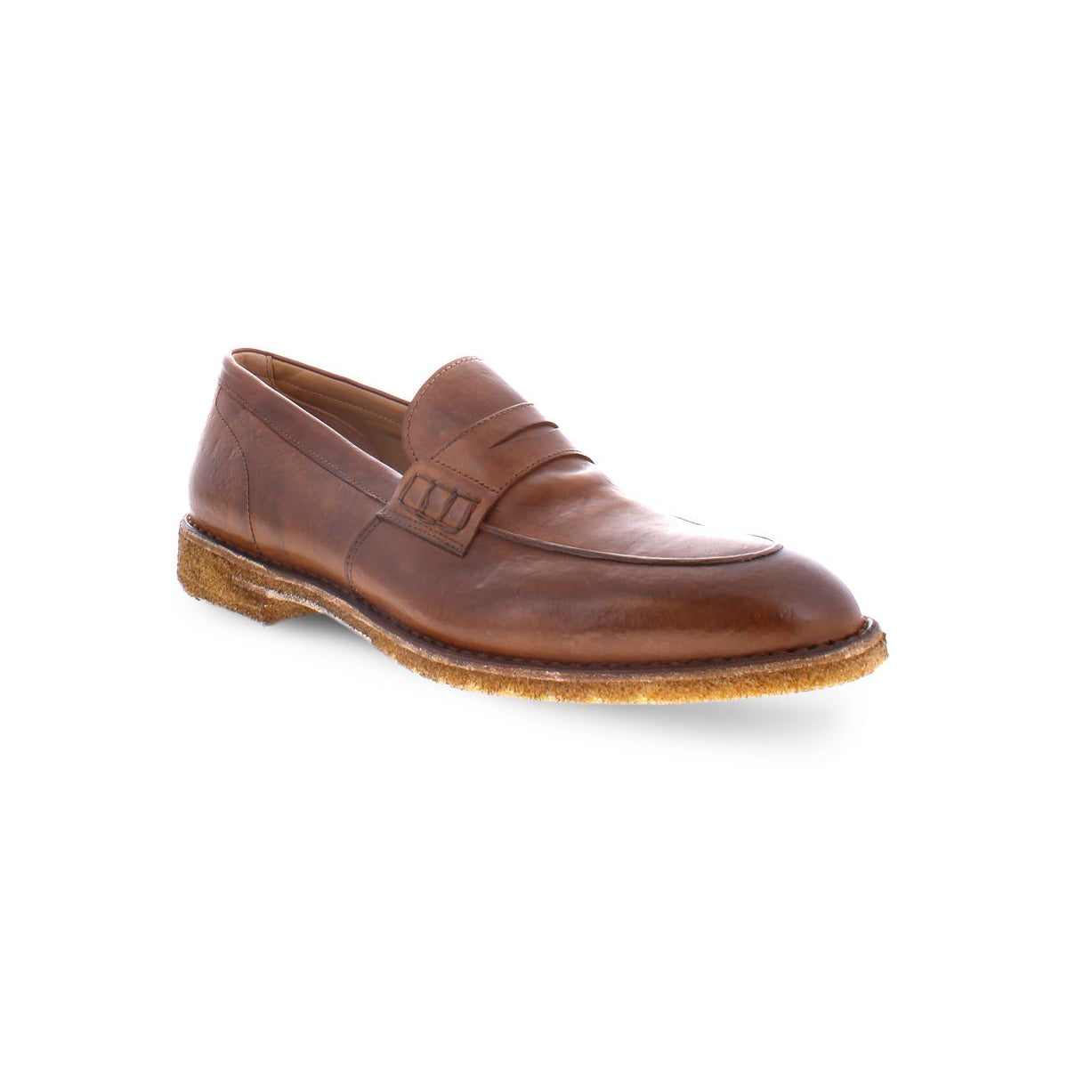 The Bed|Stü Envoy loafer is crafted from premium Italian brown leather and features a low heel, intricate stitched detailing, and a decorative strap across the upper. Handcrafted with care, these loafers boast a textured rubber sole for added grip and are beautifully displayed against a white background.