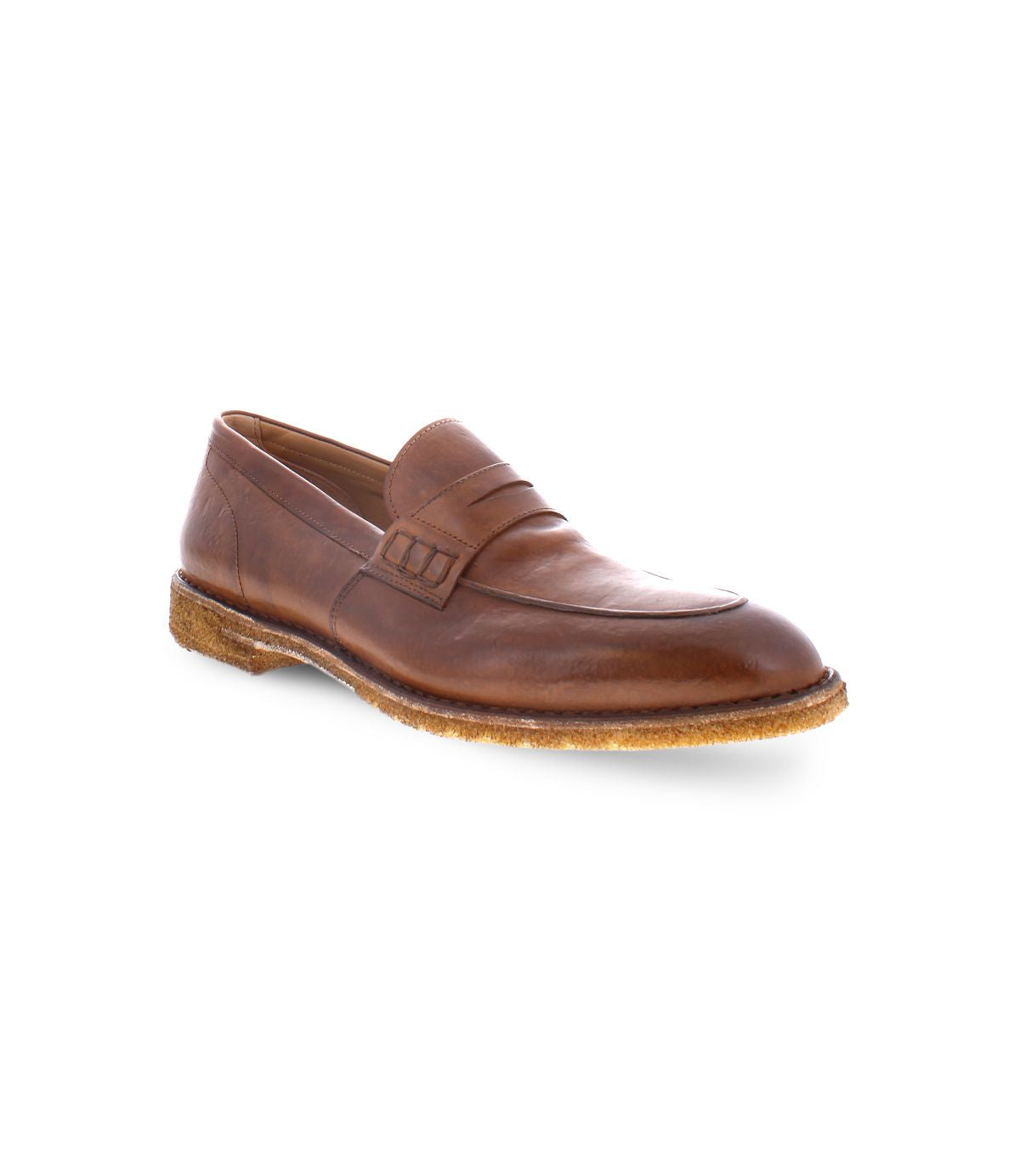 The Bed|Stü Envoy loafer is crafted from premium Italian brown leather and features a low heel, intricate stitched detailing, and a decorative strap across the upper. Handcrafted with care, these loafers boast a textured rubber sole for added grip and are beautifully displayed against a white background.