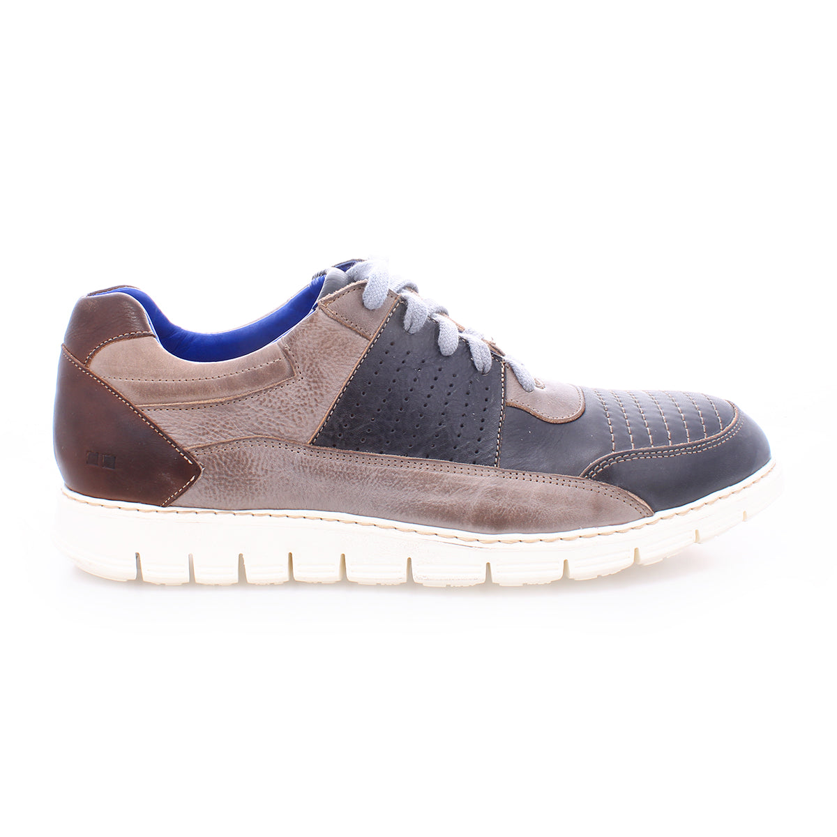 The Fairman men's sneaker by Bed|Stü showcases three-tone leather panels in brown, grey, and black, accented with grey laces, blue lining, and a lightweight white rubber sole. Shown in a side profile on a white background.