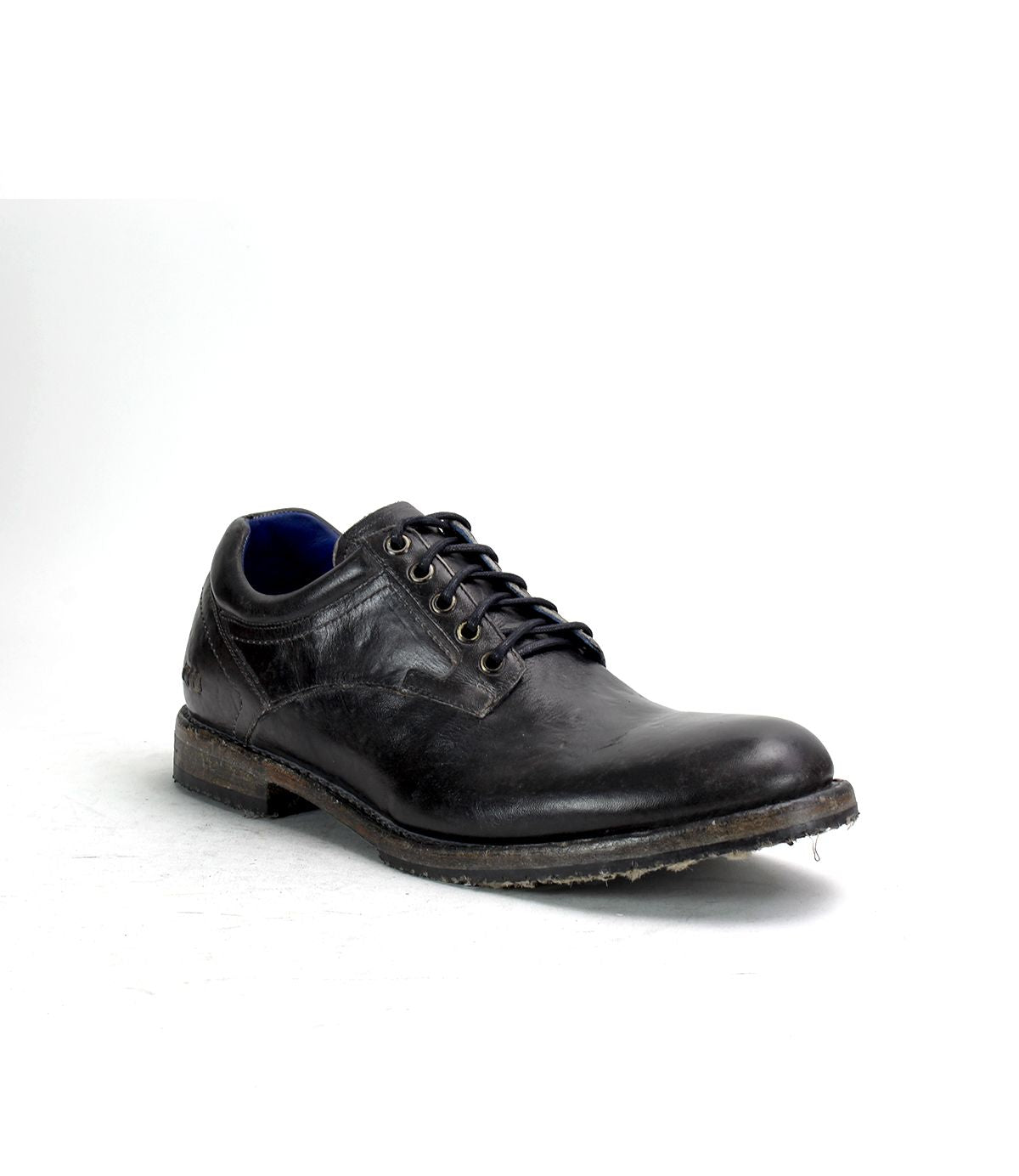 A single Fierce black washed leather derby dress shoe by Bed|Stü, with laces, a slightly worn sole, blue inner lining, and Goodyear welt construction, photographed against a plain white background.