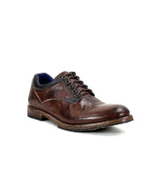 A single Fierce derby lace-up dress shoe by Bed|Stü, crafted from brown washed leather with visible stitching, a Goodyear welt, and a slightly worn sole, is photographed against a white background.