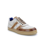 Introducing the Bed|Stü Firepower: a beige and brown casual sneaker with a lace-up closure, featuring a white side panel adorned with subtle leather stripe details, brown accents, and a gum-colored textured sole. Photographed on a white background.