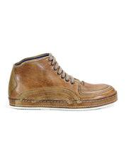 The Bed|Stü Formation is a brown leather high-top sneaker, featuring beige laces, detailed stitching, and a flat white sole. Its classic high-top silhouette and leather paneling are highlighted in a side profile view against a white background.