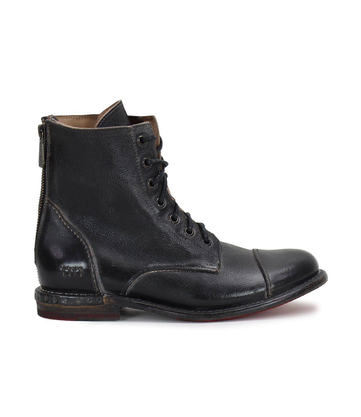 The Bed|Stü Laurel is a black leather combat-style boot featuring a side zipper, cap toe, and visible stitching, shown in profile on a white background.