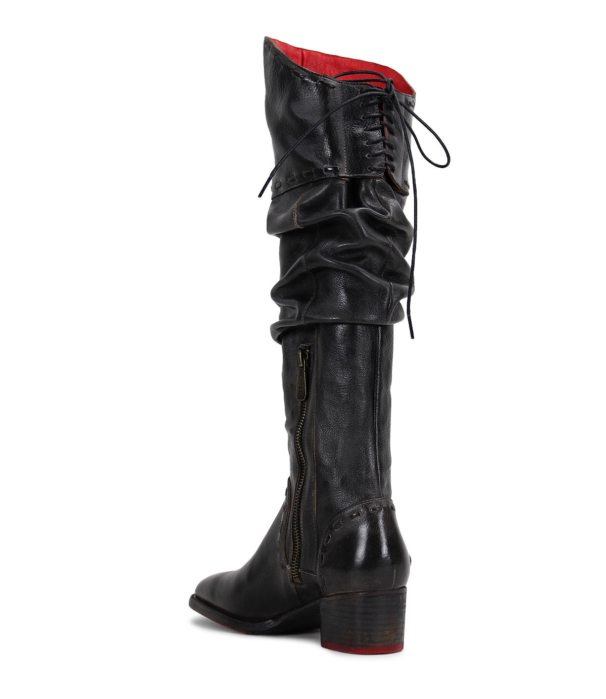 Introducing the Leilani boot by Bed|Stü: a tall, black leather standout featuring elegant ruching, a slightly slouched silhouette, stacked heel, side zipper, chic lace-up detailing at the top, and a striking red interior lining for sophisticated appeal.