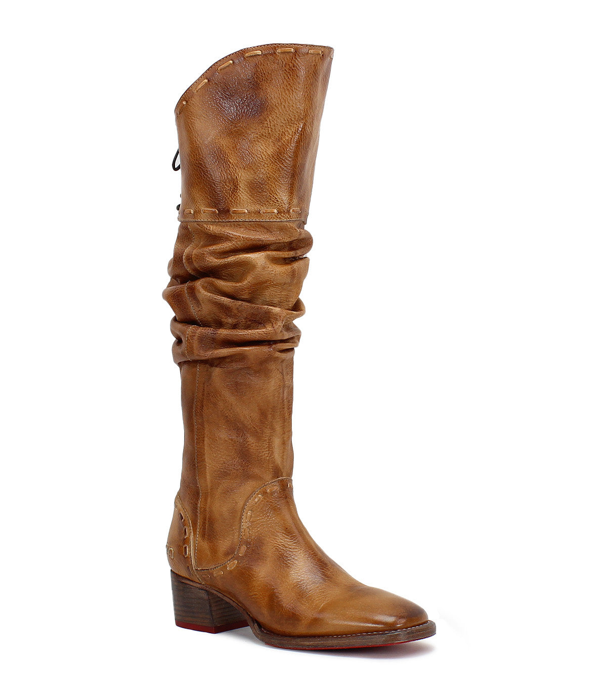 Experience standout style with the Bed|Stü Leilani boot—a tall brown leather design featuring a slightly slouched shaft with elegant ruching, rounded toe, block heel, and visible stitching details on both the upper and sole.