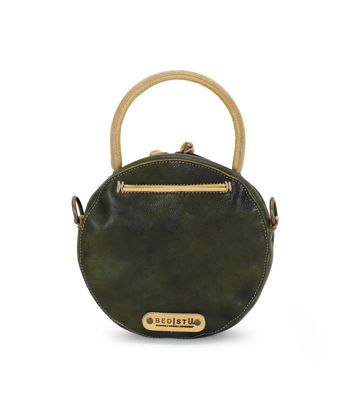 The Arenfield by Bed|Stü is a round green leather crossbody bag featuring a tan top handle, tan zip-top closure, and an adjustable strap. The "Bed|Stü" label appears on the front, and the handbag is photographed against a white background.