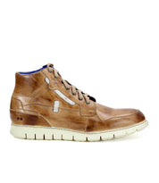 The Bed|Stü Galahad is a brown leather high-top sneaker featuring a lightweight sole, white accents, and visible stitching, shown from the side against a white background.